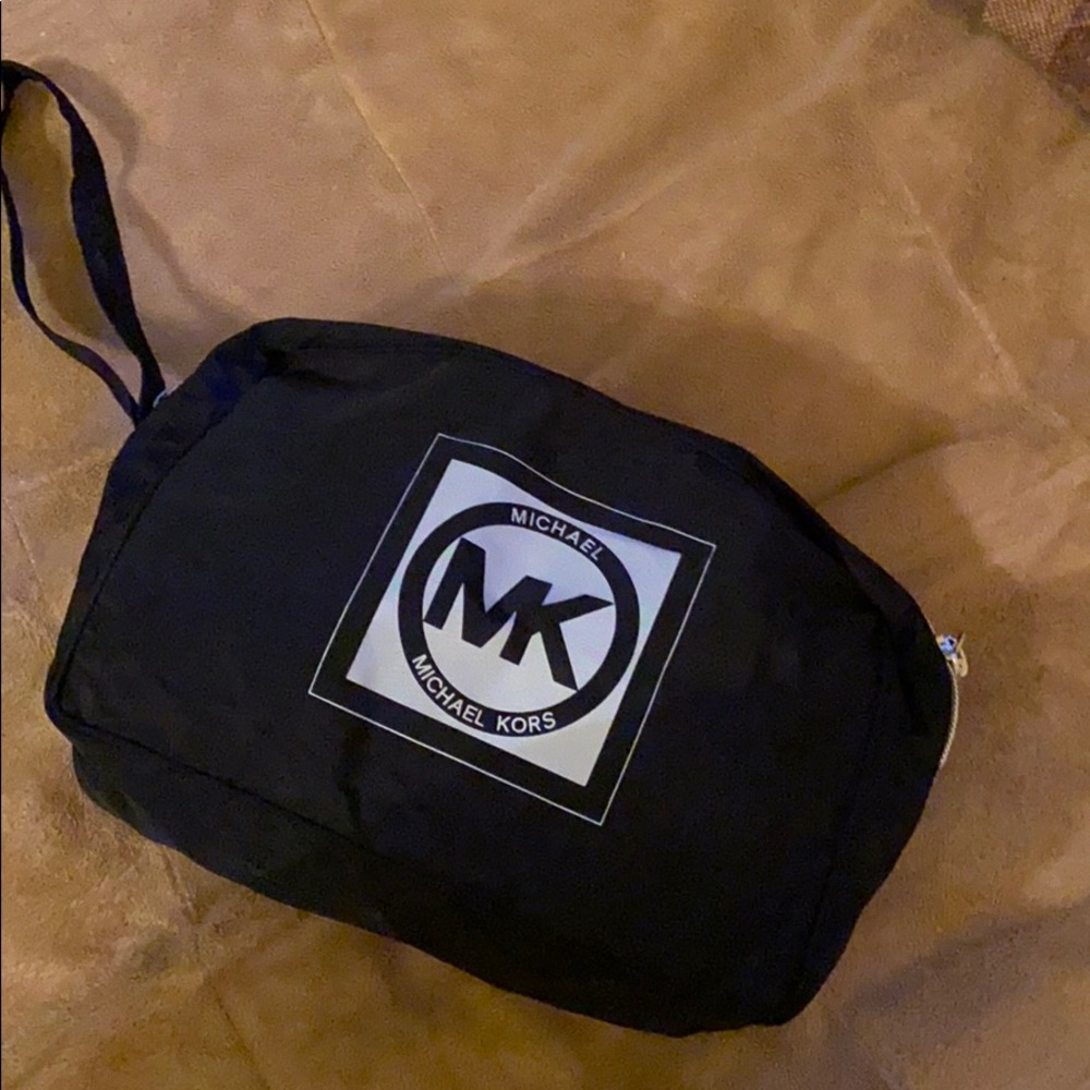 Michael Kors $10! Only wristlet not used clean